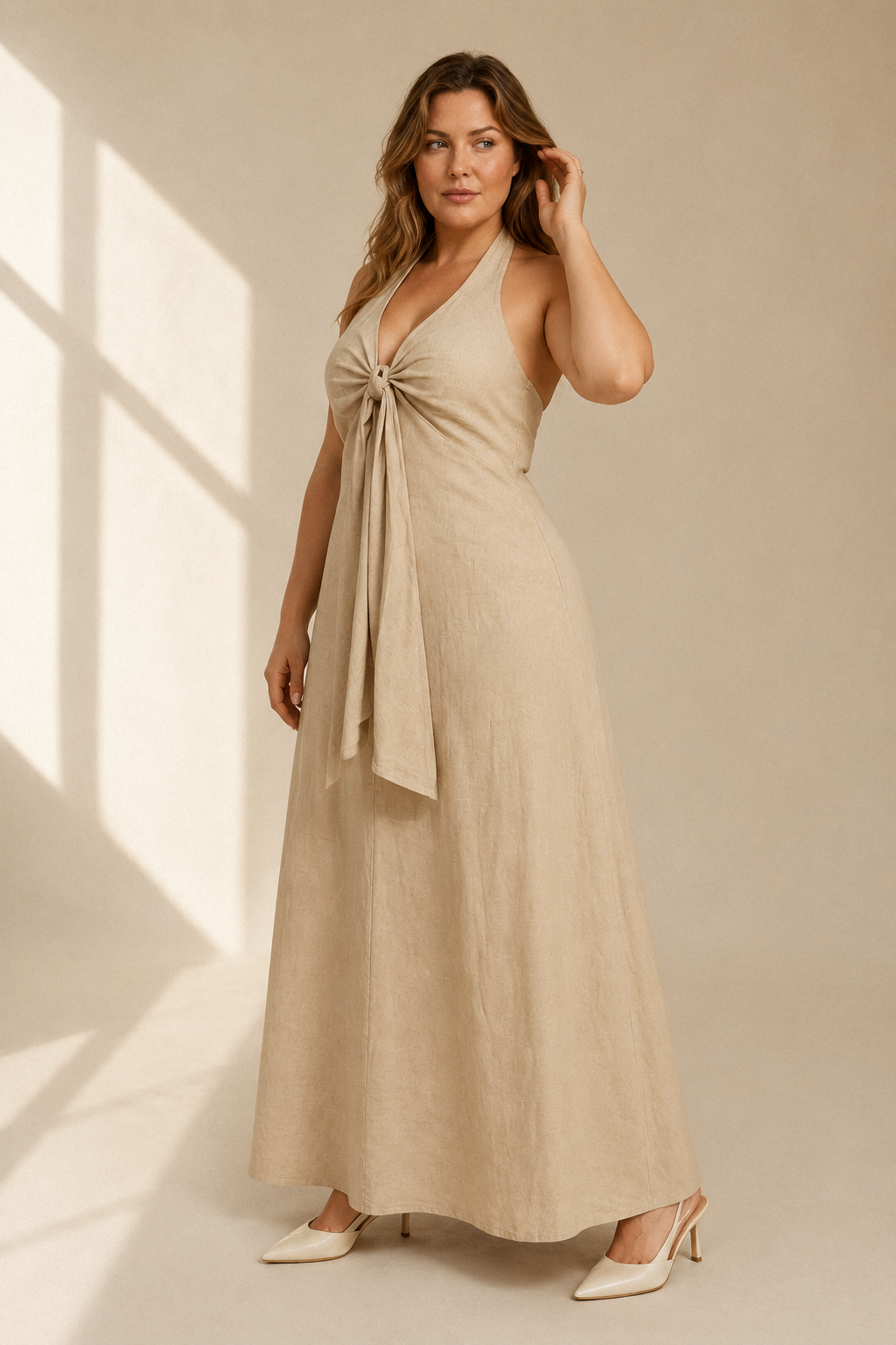 Beige linen a-line maxi dress, three-quarter view, fabric drape, subtle texture, A-line flow
