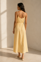 Butter yellow linen slip maxi dress, back view, simple back and flowing skirt