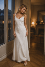 White linen slip maxi dress, front view, low scoop back and flowing skirt