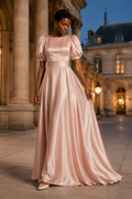 Blush pink silk a-line maxi dress, front view, round neckline, puff sleeves, defined waist
