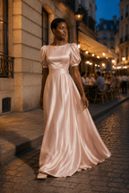 Blush pink silk a-line maxi dress, lifestyle, soft light, quiet elegance