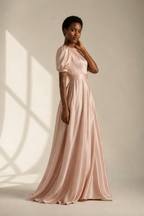 Blush pink silk a-line maxi dress, three-quarter view, gentle drape, full skirt movement
