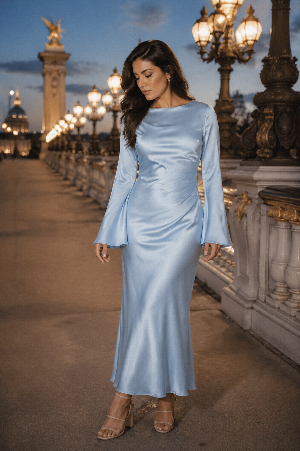 Light blue silk column maxi dress, front view, draped neckline and flared cuffs