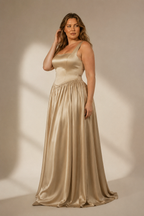 Champagne silk column maxi dress, three-quarter view, draped silk fabric