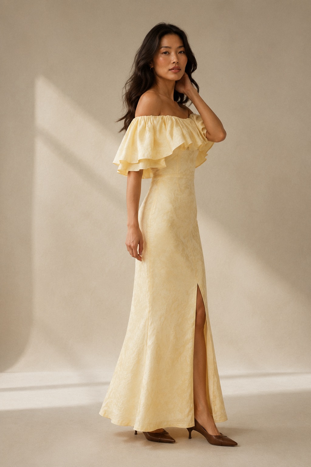 Butter yellow linen column maxi dress, three-quarter view, body-skimming fit, gentle skirt flare