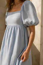 Light blue linen a-line maxi dress, fabric detail, flax weave in raking light