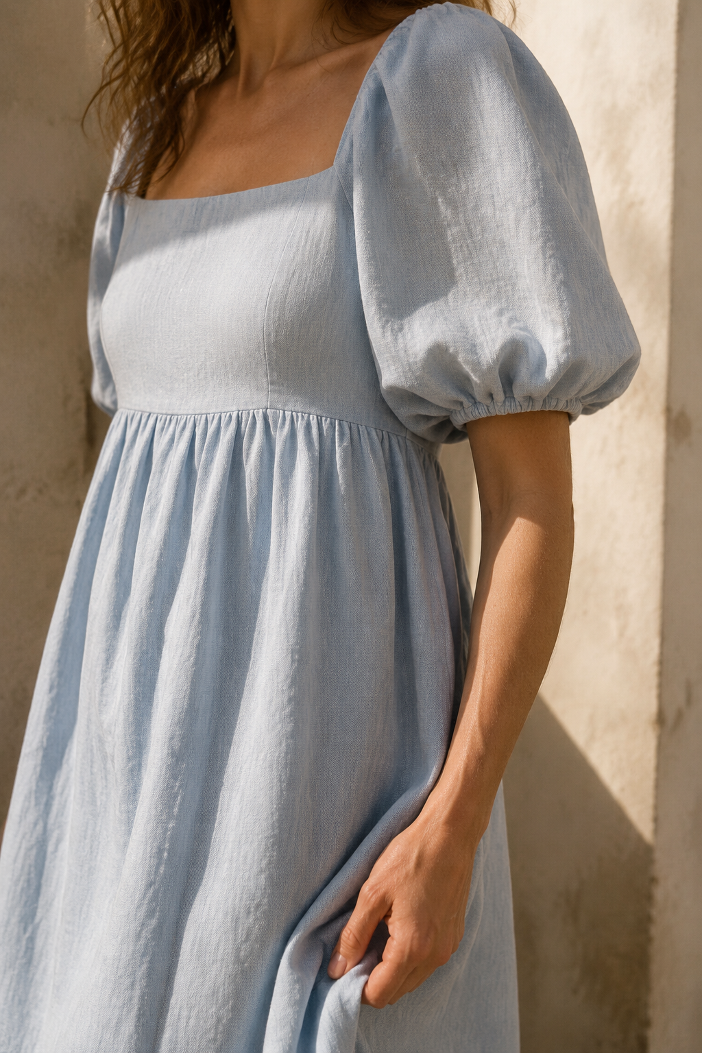 Light blue linen a-line maxi dress, fabric detail, flax weave in raking light