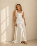 Ivory satin a-line maxi dress, front view on model, square neckline, basque waist, gathered skirt