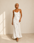 Ivory satin slip maxi dress, front view on model, scoop neckline and spaghetti straps