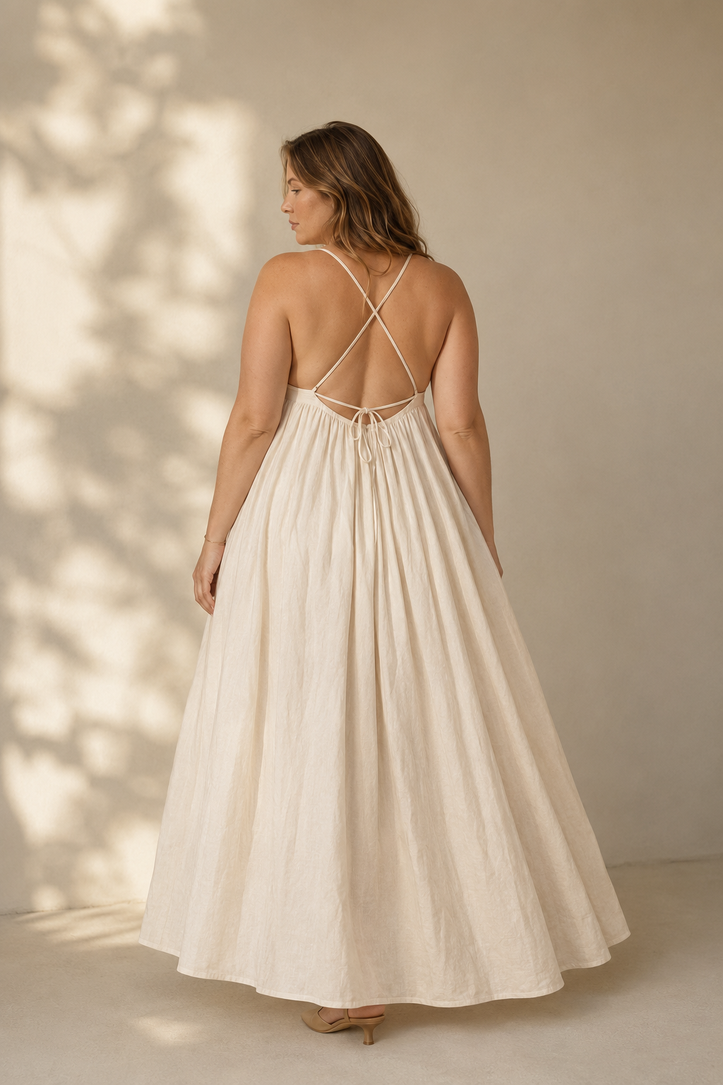 Ivory linen a-line maxi dress, back view, delicate spaghetti straps