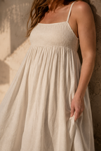 Ivory linen a-line maxi dress, fabric detail, flax weave in raking light