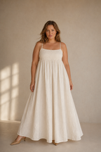 Ivory linen a-line maxi dress, full front view, gathered bodice and flowing A-line skirt