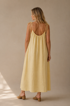Pale yellow linen shift maxi dress, back view, loose fit, simple back