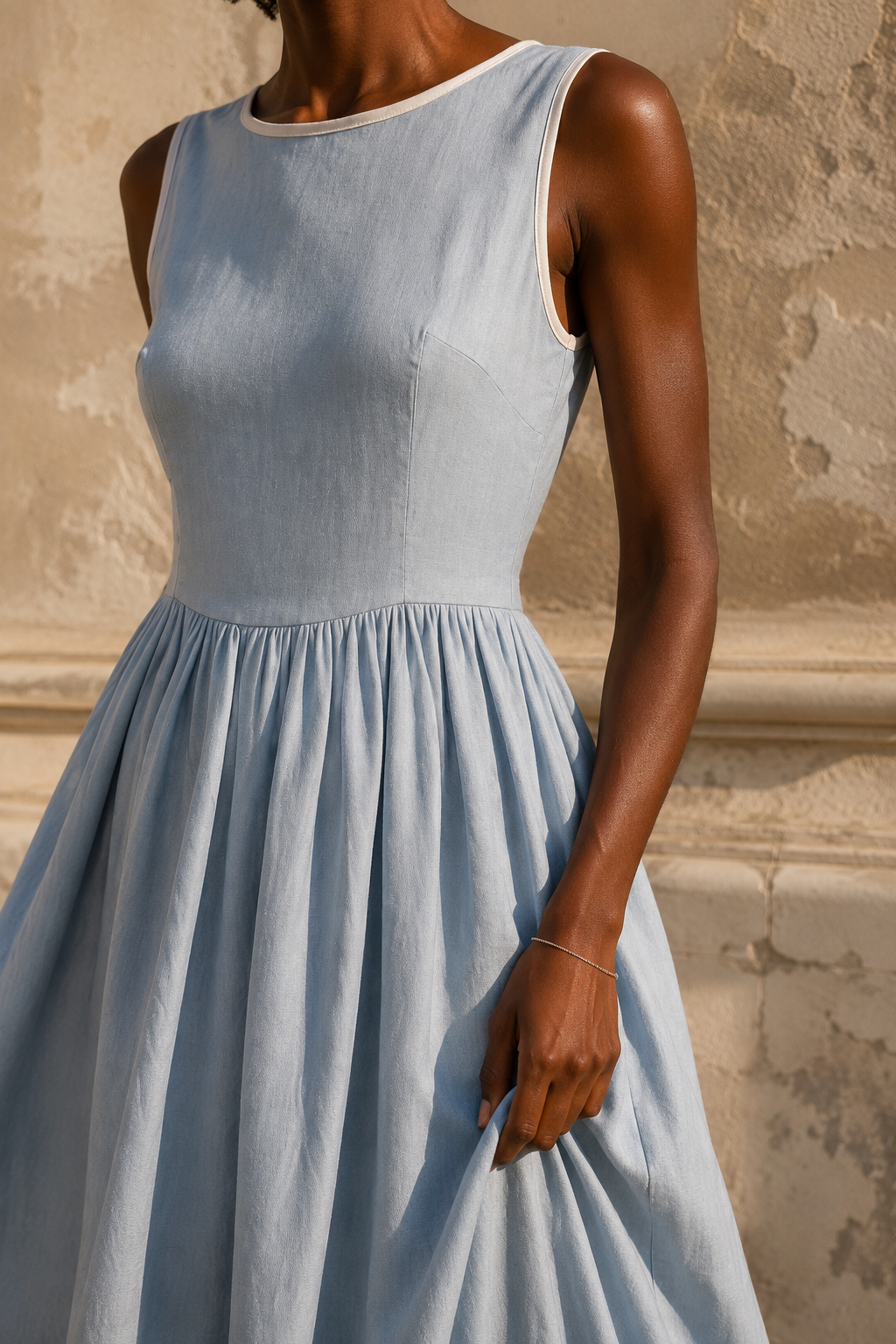 Light blue linen a-line maxi dress, fabric detail, flax weave in raking light