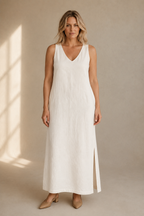 Ivory linen shift maxi dress, full front view, sleeveless design and side pockets