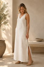 Ivory linen shift maxi dress, three-quarter view, relaxed silhouette and side slits