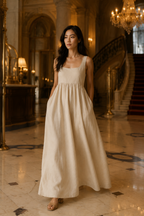 Ivory linen a-line maxi dress, lifestyle, sunlit arches, relaxed afternoon feel