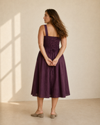 Deep plum linen fit-and-flare midi dress, back view, corset lace-up back, smocked side panels
