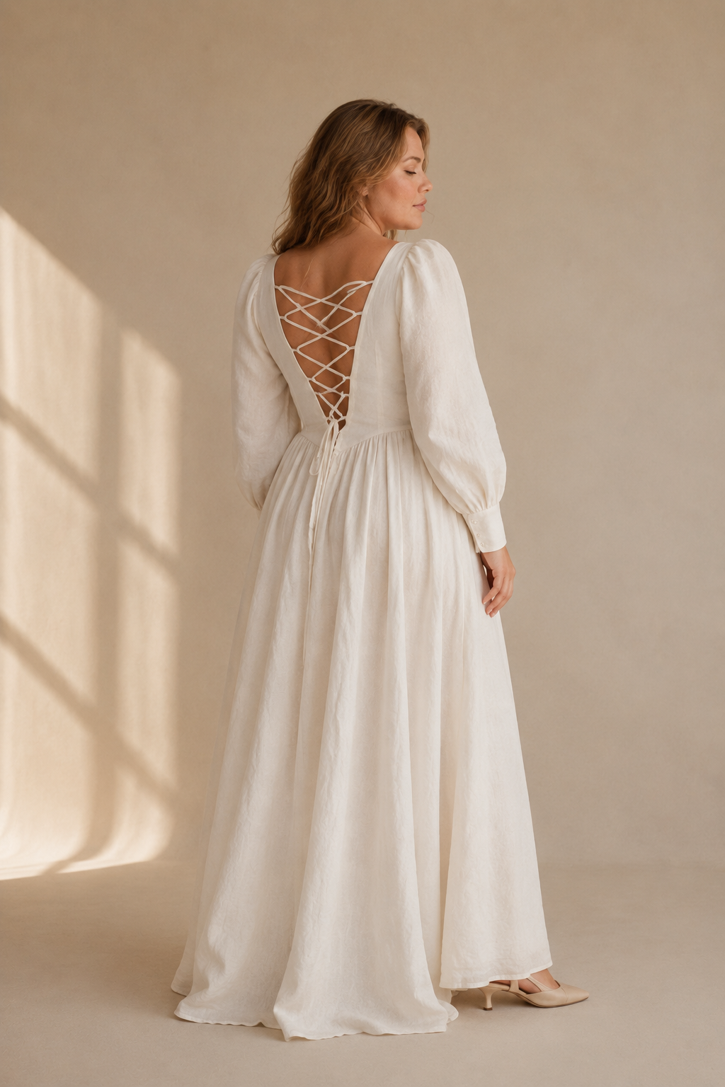 Ivory linen a-line maxi dress, back view, clean back and full skirt drape