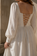 Ivory linen a-line maxi dress, fabric detail, flax weave in raking light