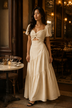 Ivory linen tiered maxi dress, lifestyle, walking through sun-dappled arches