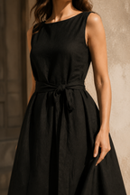 Black linen a-line maxi dress, fabric detail, flax weave in raking light
