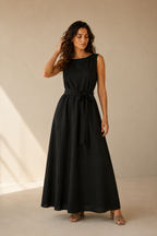 Black linen a-line maxi dress, full front view, sleeveless maxi dress, self-tie waist
