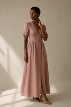 Dusty rose linen a-line maxi dress, three-quarter view, flowing A-line skirt, full button placket