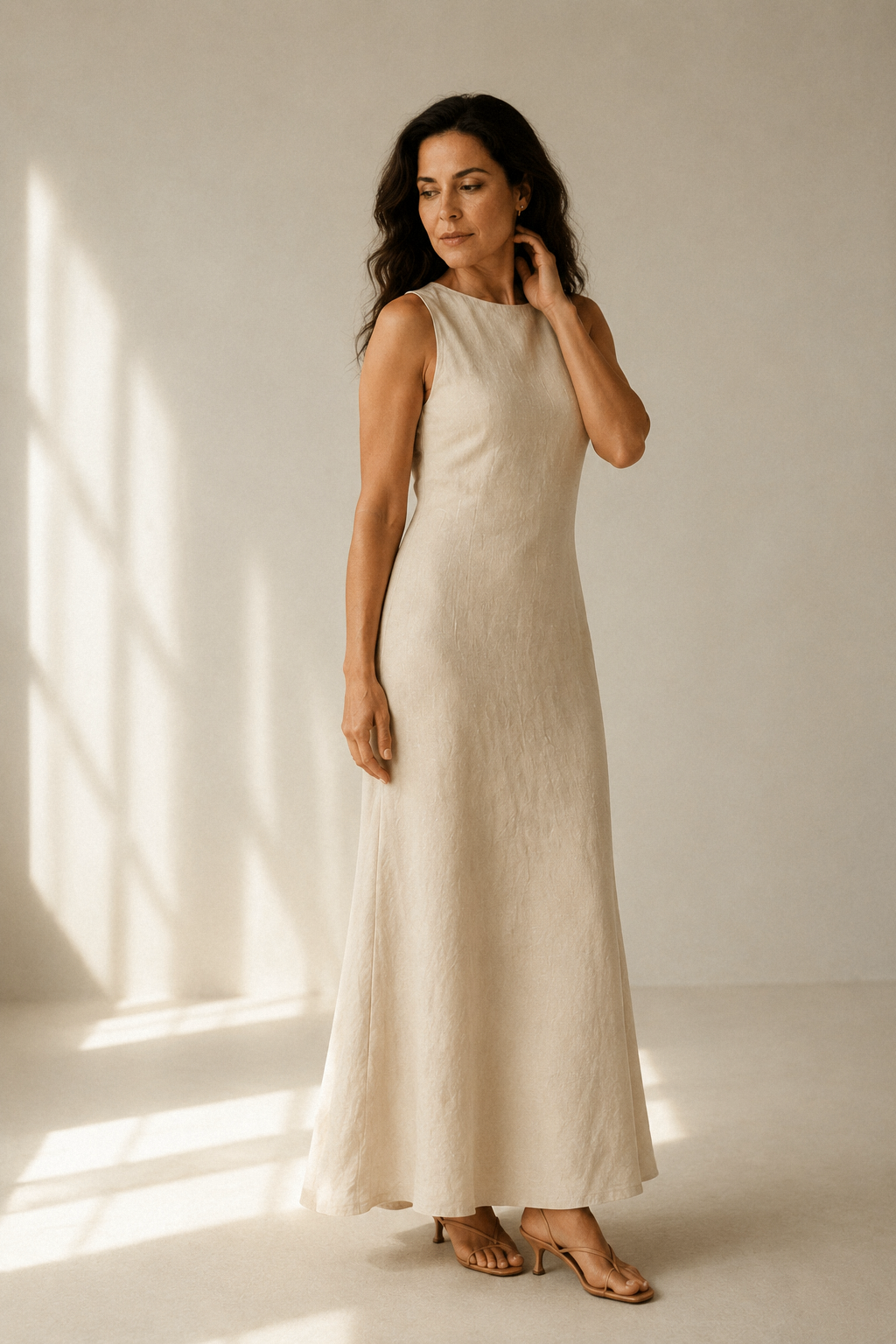 Oatmeal linen column maxi dress, three-quarter view, natural drape, flattering lines