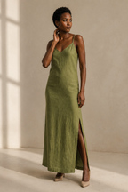 Olive green linen slip maxi dress, three-quarter view, relaxed silhouette, natural linen texture