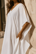 White cotton caftan maxi dress, fabric detail, cotton weave in raking light