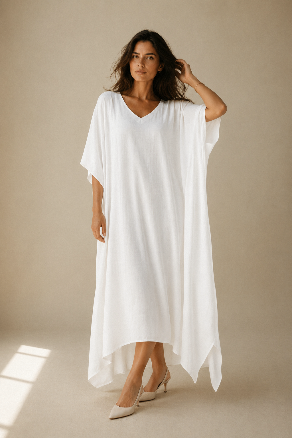 White cotton caftan maxi dress, full front view, flowing maxi dress with high-low hem