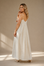 Ivory linen slip maxi dress, three-quarter view, soft linen drape