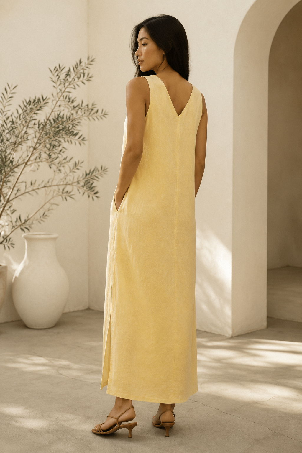 Butter yellow linen shift maxi dress, back view, unadorned back silhouette
