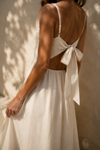 Ivory linen a-line maxi dress, fabric detail, flax weave in raking light