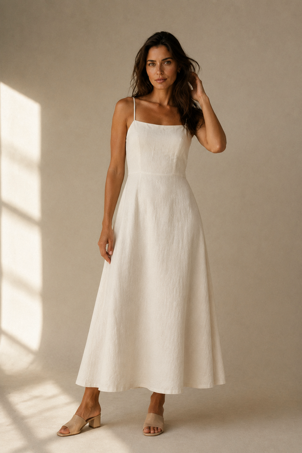 Ivory linen a-line maxi dress, full front view, straight neckline and flowing skirt