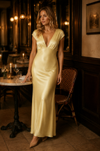 Butter yellow silk column maxi dress, lifestyle, afternoon light, quiet sophistication