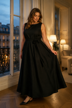 Black linen trapeze maxi dress, front view, deep V back and tie detail