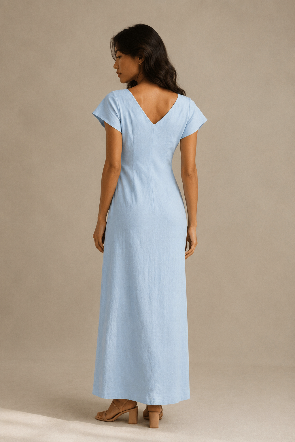 Light blue linen column maxi dress, back view, clean back and gentle drape