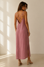 Dusty pink linen slip maxi dress, back view, deep V back and crisscross straps