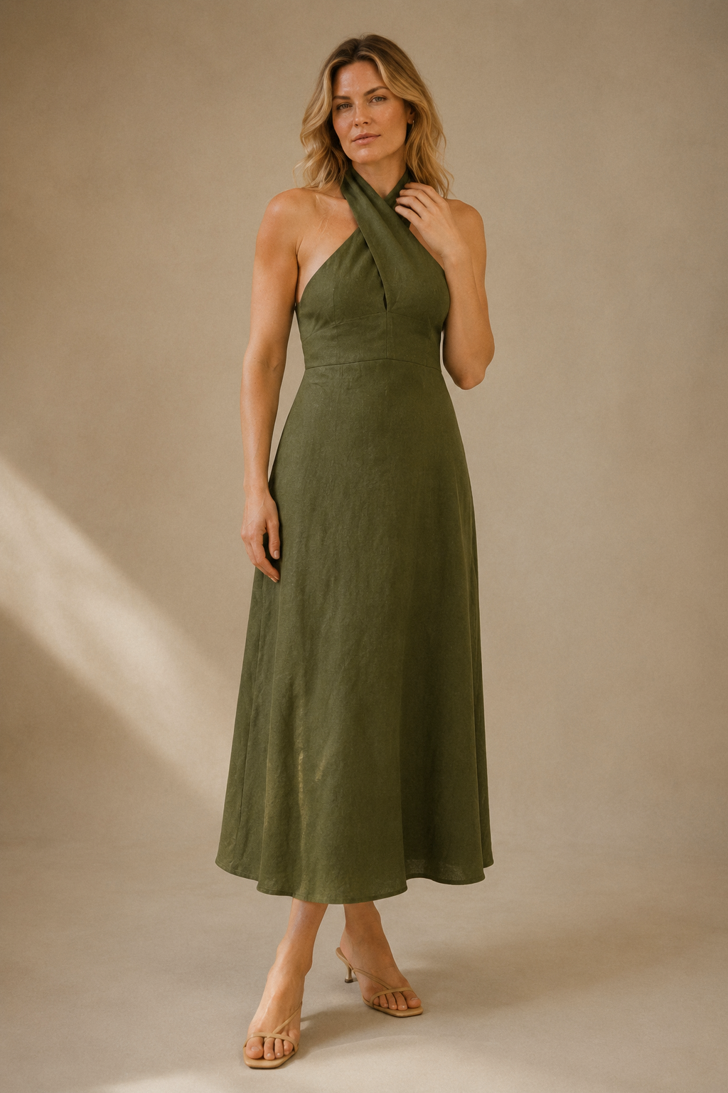 Olive green linen a-line maxi dress, full front view, fitted bodice and maxi length
