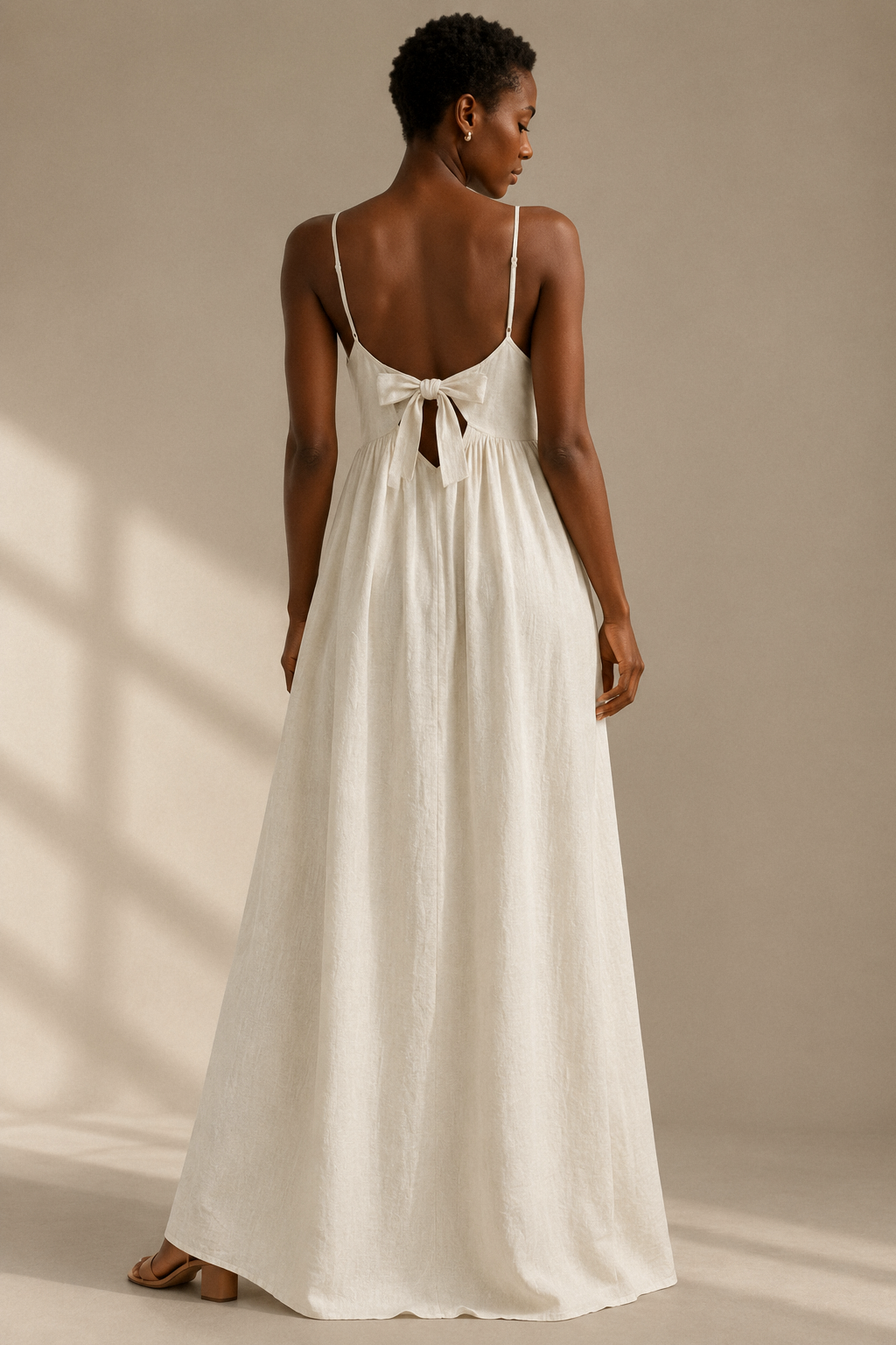 Ivory linen a-line maxi dress, back view, simple back and soft drape