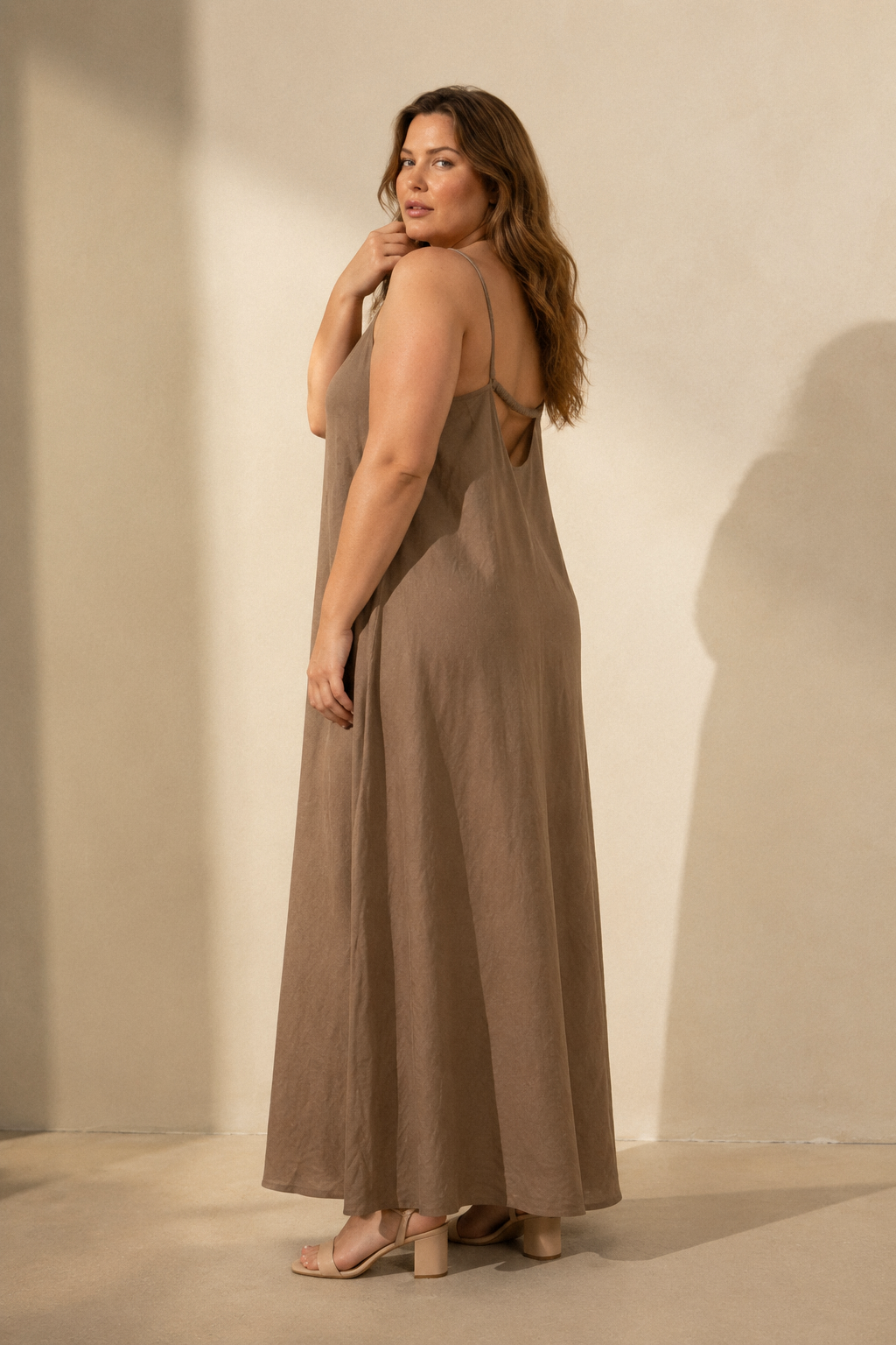 Taupe linen slip maxi dress, three-quarter view, relaxed fit and fabric drape
