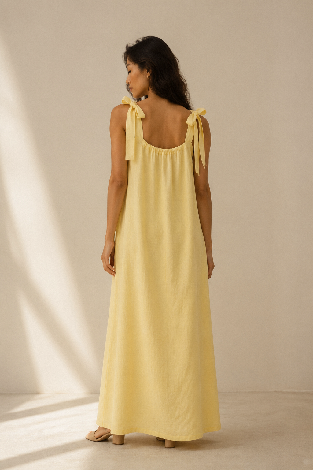 Butter yellow linen shift maxi dress, back view, smooth back with straight cut