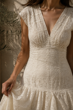 Ivory lace a-line maxi dress, fabric detail, fabric texture in raking light