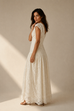 Ivory lace a-line maxi dress, three-quarter view, textured fabric and skirt drape