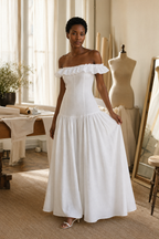 White linen a-line maxi dress, lifestyle, afternoon stroll, sunlit garden