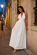 White linen a-line maxi dress, front view, halter V-neck and gathered waist