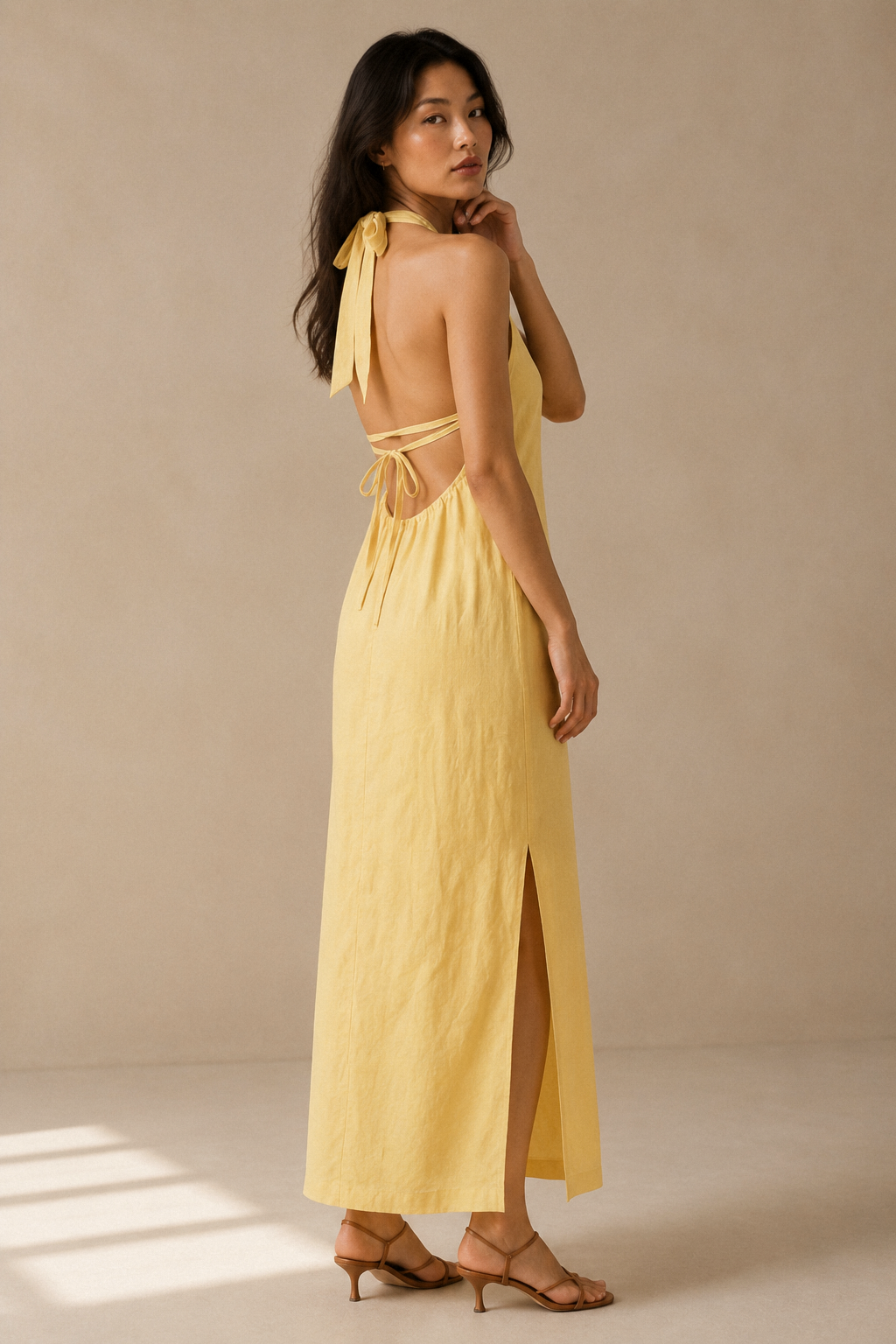 Butter yellow linen shift maxi dress, three-quarter view, open back and side tie details