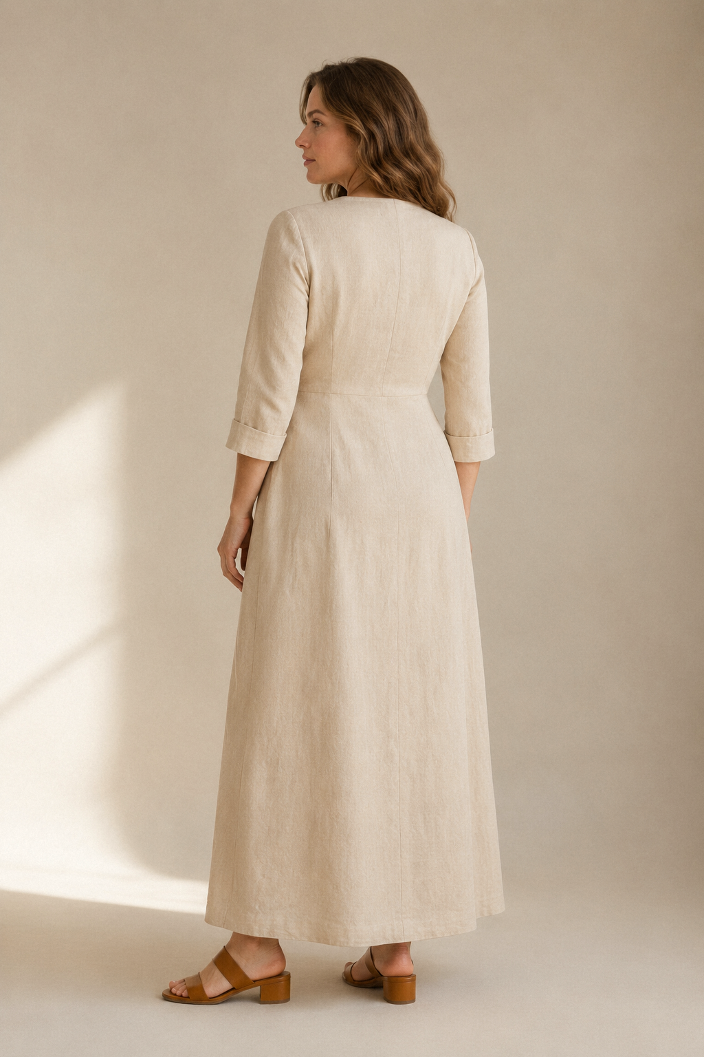 Beige linen wrap maxi dress, back view, smooth back with gentle drape